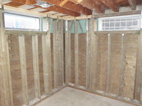 Preserved wood foundation (PWF) interior reinforcement wall constructed